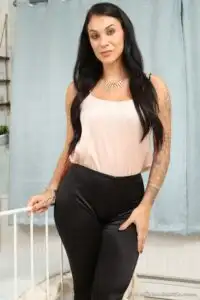 Image 1 of, OnlySilkAndSatin Roxy Mendez wearing tight leggings over pantyhose