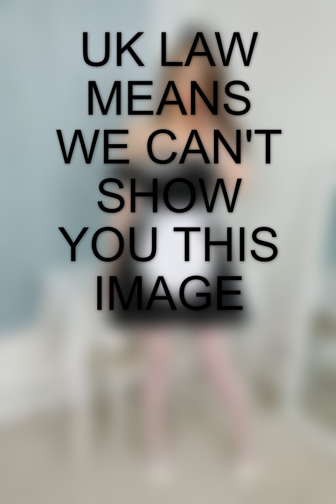 Only-Opaques Jorja in a miniskirt, high heels and patterned stockings