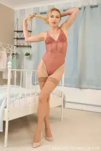 Art-Lingerie Minx in a bodysuit with sheer stockings 