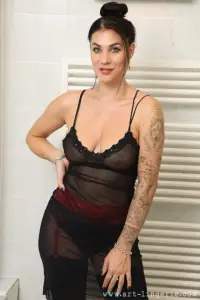 Art-Lingerie Roxy Mendez having a shower in lingerie and stockings 