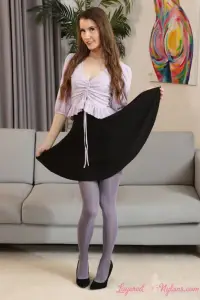 Layered-Nylons Brook L in a black skirt with stockings over pantyhose 