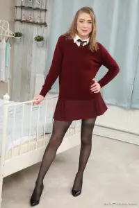 Only Tease Crystal B in a college uniform and sheer black pantyhose 