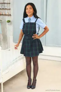 Only Tease Jay in a college uniform with a minidress and stockings 