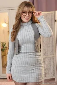 Only-Secretaries Kitty Cashew in a grey minidress and shiny pantyhose 