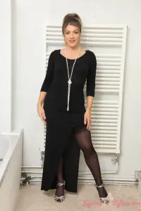Layered-Nylons Tillie removes her evening dress to shower in nylons
