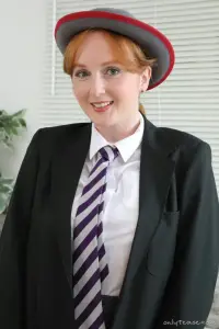 Only Tease Miss Daphne Red in a college uniform and knee high socks